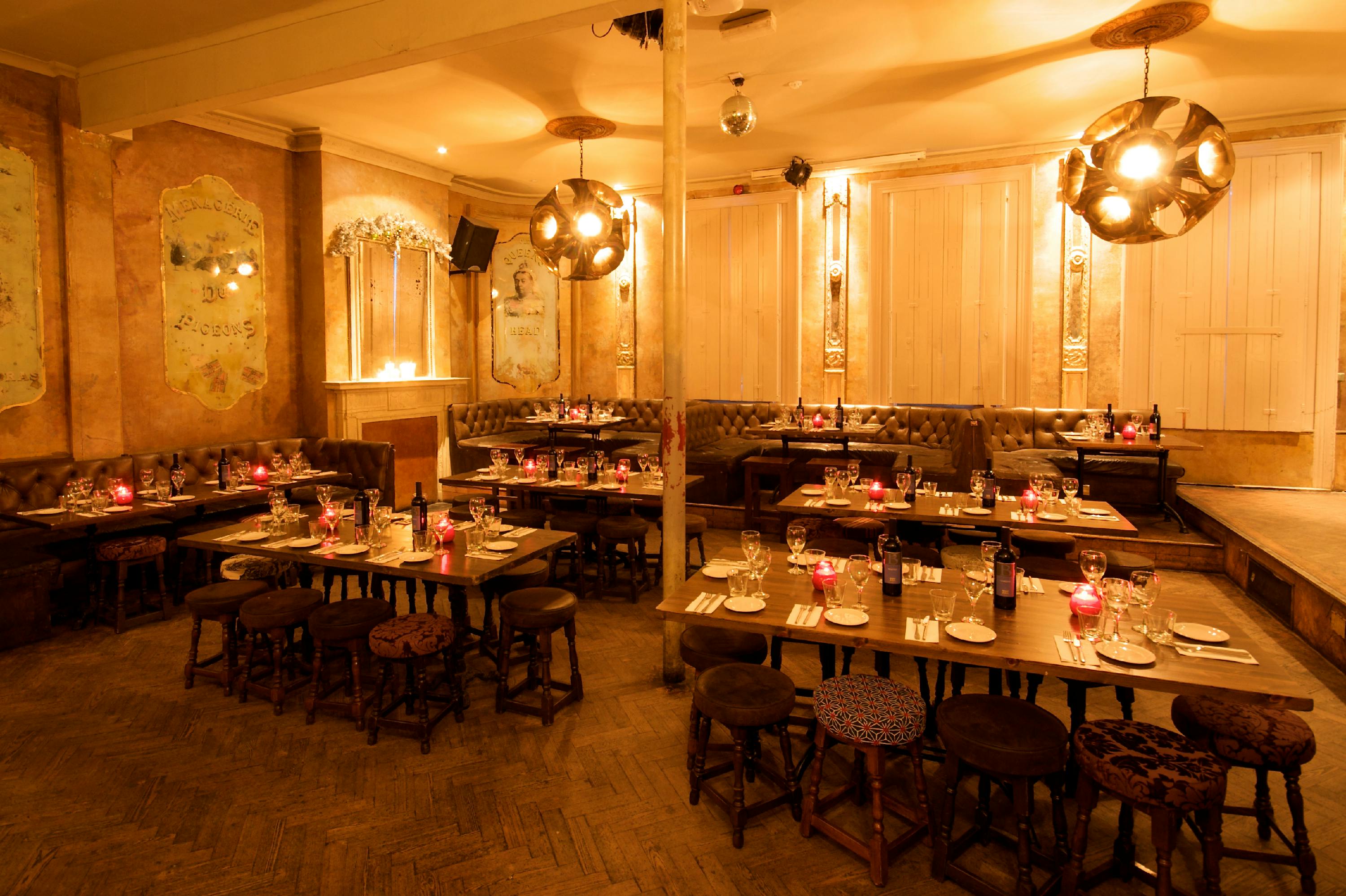 Stylish event space at The Old Queen's Head, perfect for intimate gatherings and dinners.